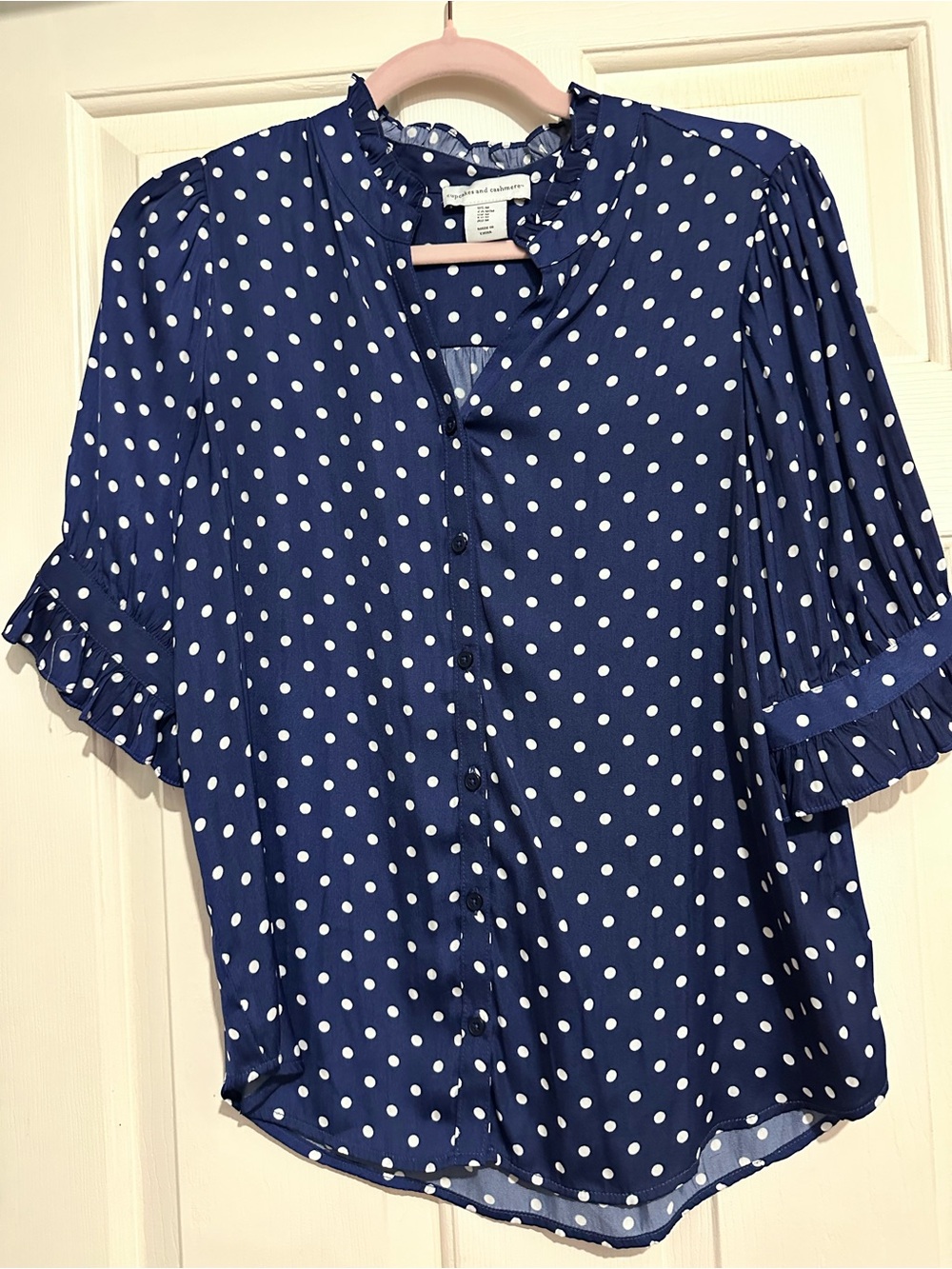 cupcakes & cashmere Navy and White Polka Dot Ruffle Sleeve Blouse